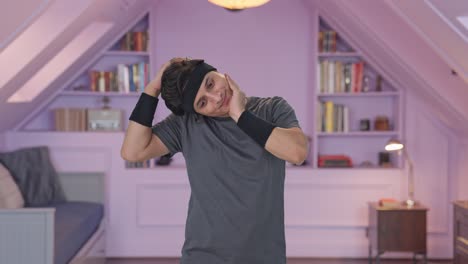 Happy-Indian-man-doing-neck-exercise