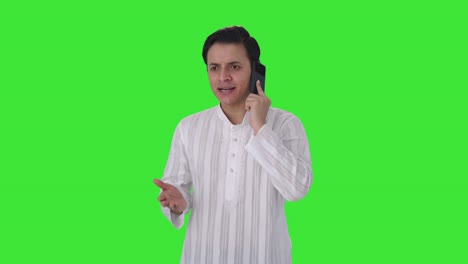 Angry-Indian-man-shouting-on-call-Green-screen