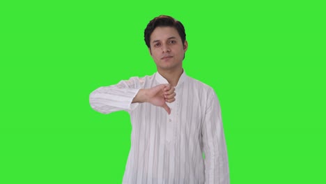 Disappointed-Indian-man-showing-thumbs-down-Green-screen
