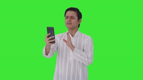Angry-Indian-man-shouting-on-video-call-Green-screen