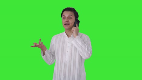 Happy-Indian-man-talking-on-mobile-phone-Green-screen