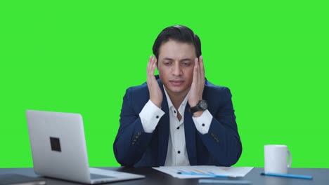 Indian-businessman-getting-stressed-at-work-Green-screen