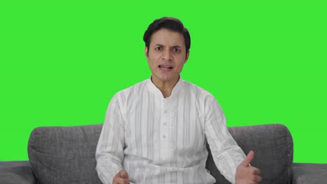 Angry-Indian-man-shouting-on-someone-Green-screen