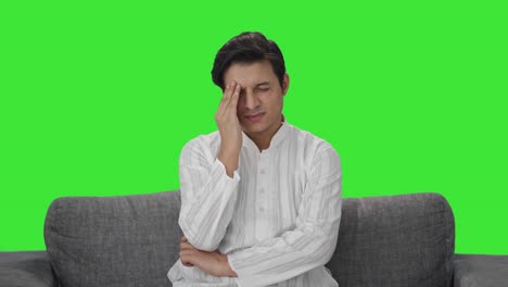 Worried-Indian-man-slapping-his-head-Green-screen
