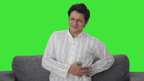 Kranker-Indischer-Mann-Mit-Rückenschmerzen,-Grüner-Bildschirm