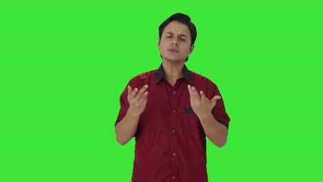 Indian-house-keeper-talking-to-someone-Green-screen