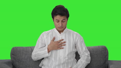 Sick-Indian-man-having-acidity-Green-screen