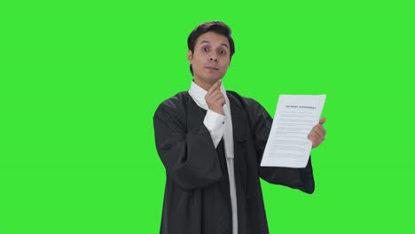 Happy-Indian-lawyer-presenting-the-case-Green-screen