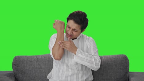Sick-Indian-man-applying-a-bandage-Green-screen