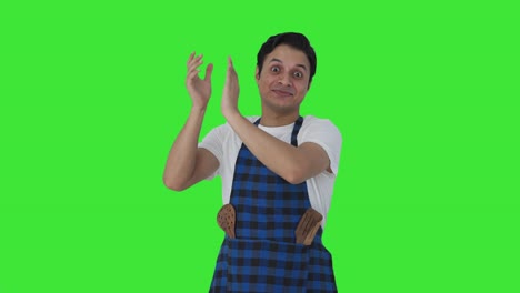 Happy-Indian-cook-clapping-and-appreciating-Green-screen