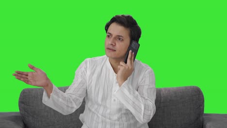 Happy-Indian-man-talking-on-phone-Green-screen