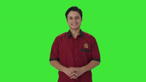 Happy-Indian-house-keeper-smiling-to-the-camera-Green-screen