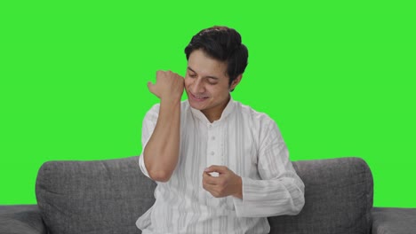 Happy-Indian-man-removing-a-bandage-Green-screen