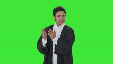 Indian-lawyer-talking-to-someone-Green-screen