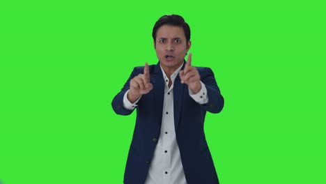 Angry-Indian-journalist-shouting-on-camera-Green-screen