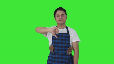 Disappointed-Indian-cook-showing-thumbs-down-Green-screen