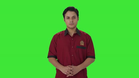 Serious-Indian-house-keeper-looking-at-the-camera-Green-screen
