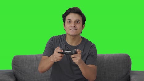 Hombre-Indio-Jugando-Videojuegos-Pantalla-Verde