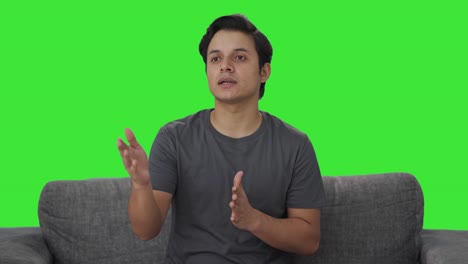 Serious-Indian-man-talking-to-the-camera-Green-screen