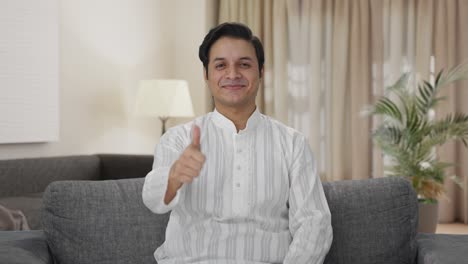 Happy-Indian-man-showing-thumbs-up