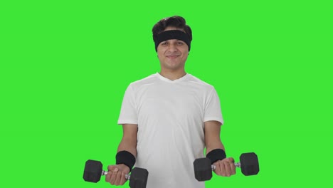 Happy-Indian-man-lifting-heavy-dumbbells-Green-screen
