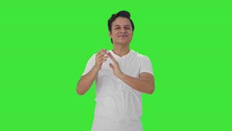 Happy-Indian-man-clapping-and-appreciating-Green-screen