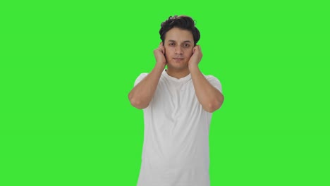 Guilty-Indian-man-saying-sorry-and-apologizing-Green-screen
