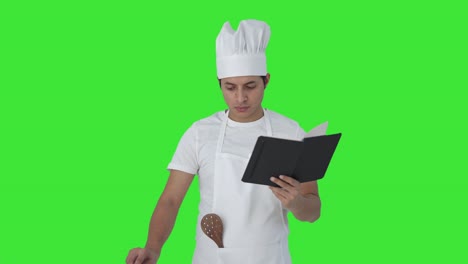 Indischer-Profikoch,-Der-Essen-Auf-Grünem-Bildschirm-Zubereitet