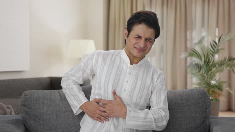 Sick-Indian-man-having-stomach-pain