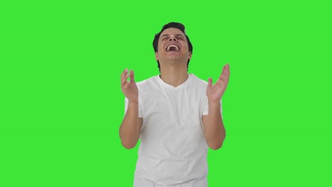 Indian-man-laughing-on-someone-Green-screen