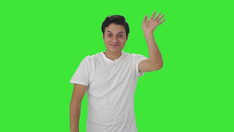 Happy-Indian-man-saying-hello-Green-screen