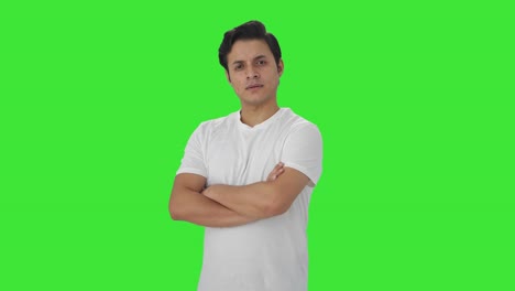 Portrait-of-Confident-Indian-man-standing-crossed-hands-Green-screen