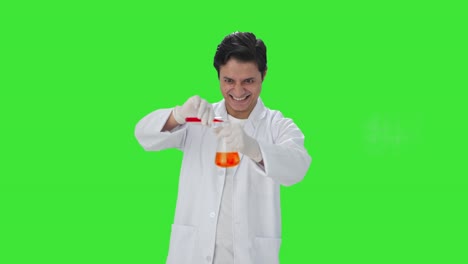 Psychic-Indian-scientist-mixing-chemicals-for-experiment-Green-screen