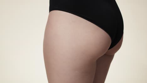 Close-up-of-buttock-of-woman-in-underwear