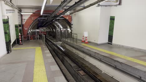 Istanbul-Elektrik-Tramway-tunnel-entrance-with-tram-cable-car-entering-station
