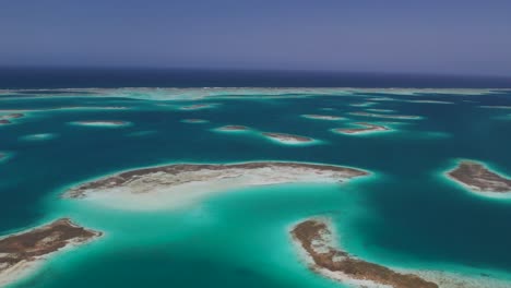 Aerial-View-Tropical-Archipelago-white-Sand-Islands-and-Turquoise-crystal-Clear-Sea
