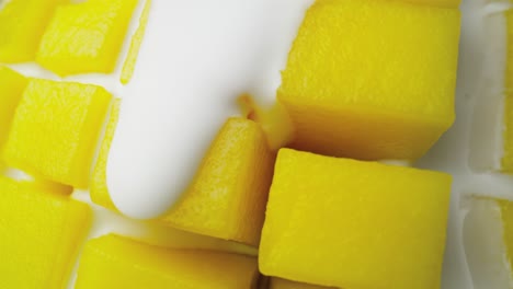 Macro-video-of-mango-covered-with-yoghurt