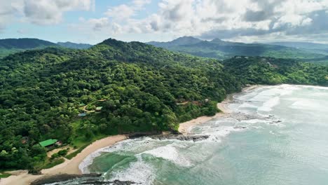 Cinematic-coast-with-beaches-and-rainforest-in-Nicaragua,-drone-establisher