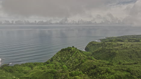 Maui-Hawaii-Aerial-v42-cinematic-drone-flyover-hillside-Honolulu-Nui-Bay-capturing-the-coastal-scenery-along-Hana-highway,-views-of-Nahiku-and-pacific-ocean---Shot-with-Mavic-3-Cine---December-2022