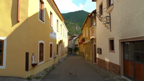 Zoom-In-of-Wosendorf-Village-Street-in-Wachau-is-an-Austrian-valley-with-a-picturesque-mountain-in-background