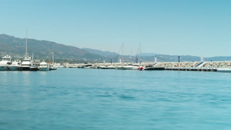 Exotic-port-with-yachts-in-Estepona,-time-lapse-pan-view