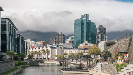 Timelapse-of-Cape-Town-Central-Business-District-With-Skyscrapers-and-Canal-Against-The-Clouds-At-Background-In-South-Africa