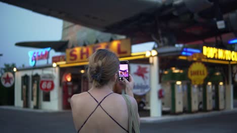 Female-Tourist-Traveling,-Sightseeing,-And-Capturing-Photos-Of-Bangkok-Thailand