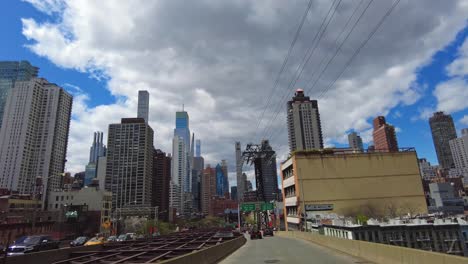 Pov-bottom-up-shot-on-road-in-New-York-City-in-Manhattan,-USA---dolly-shot