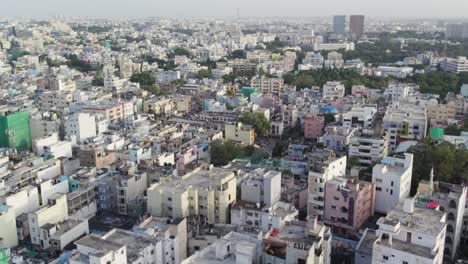 Aerial-video-Indian-city-densely-populated-city-that-was-built-to-house-IT-and-pharmaceutical-companies,-but-all-that-is-visible-there-are-mid-rise-apartments-and-residential-areas
