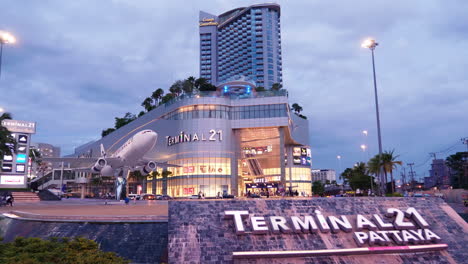 Front-view-of-Terminal-21-shopping-mall-with-Grand-Centrepoint-in-the-background,-in-Pattaya,-Chonburi-province,-Thailand