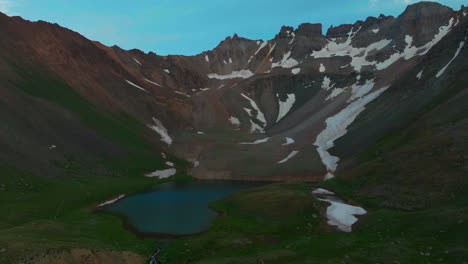 Aerial-cinematic-drone-magical-summer-sunset-dusk-Mount-Sniffels-wilderness-upper-Blue-Lakes-Southern-Colorado-San-Juan-Ridgway-Telluride-Silverton-Ouray-Rocky-Mountains-lush-green-circling-movement