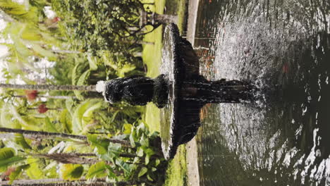 The-Azores-Islands-Beautiful-font-in-Terra-Nostra-Garden,-vertical-shot-of-water-fountain