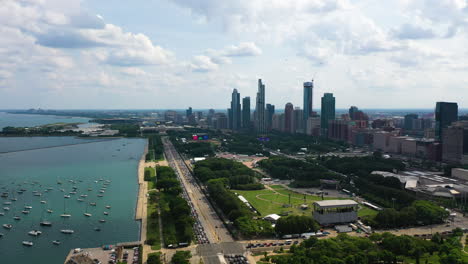 Aerial-view-following-the-Lake-shore-drive-in-the-Millennium-park-of-Chicago