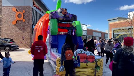 Inflatable-with-a-slide-at-a-fall-harvest-festival-on-a-sunny-day